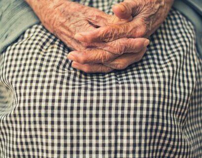 person's hand in shallow focus