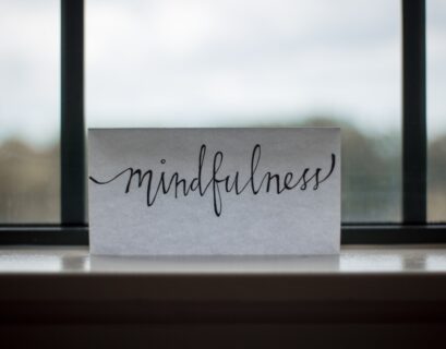 mindfulness printed paper near window