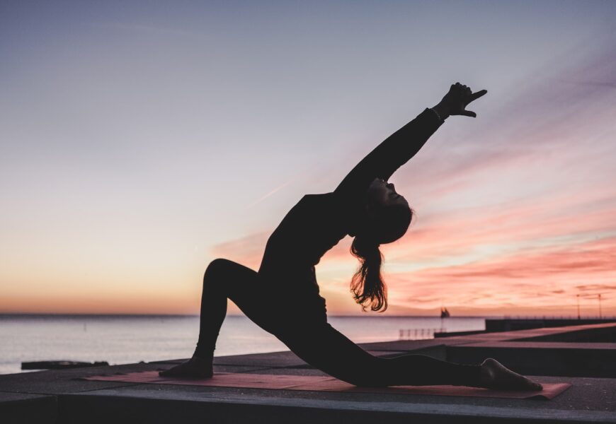 silhouette photography of woman doing yoga