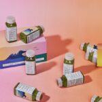 assorted bottles on brown wooden table