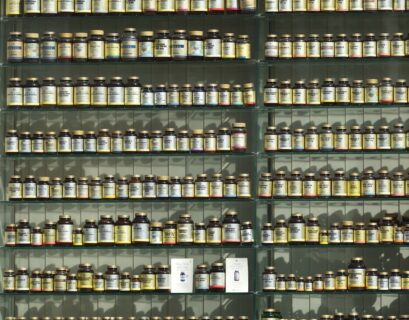 assorted labeled bottle on display shelf