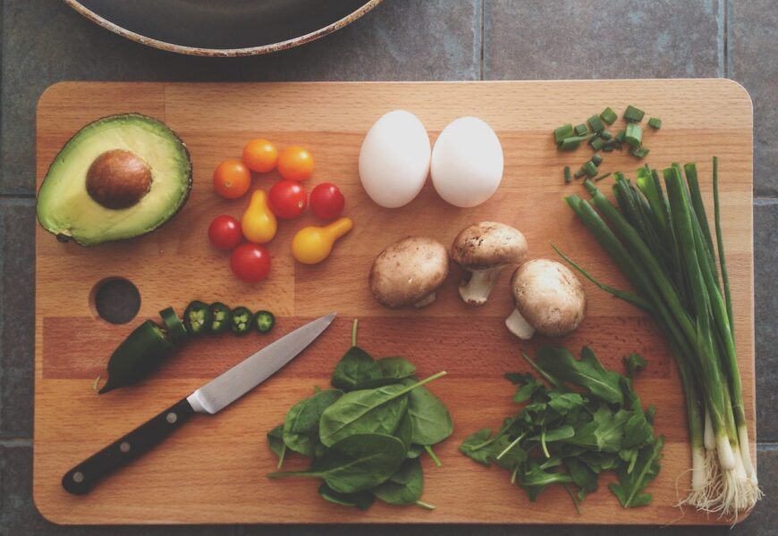 avocado, tomatoes, eggs, mushrooms, spring onions, and leaves