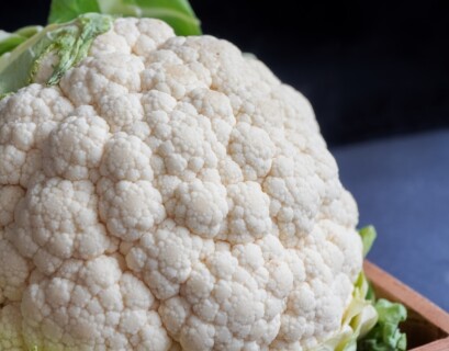 white cauliflower on black textile